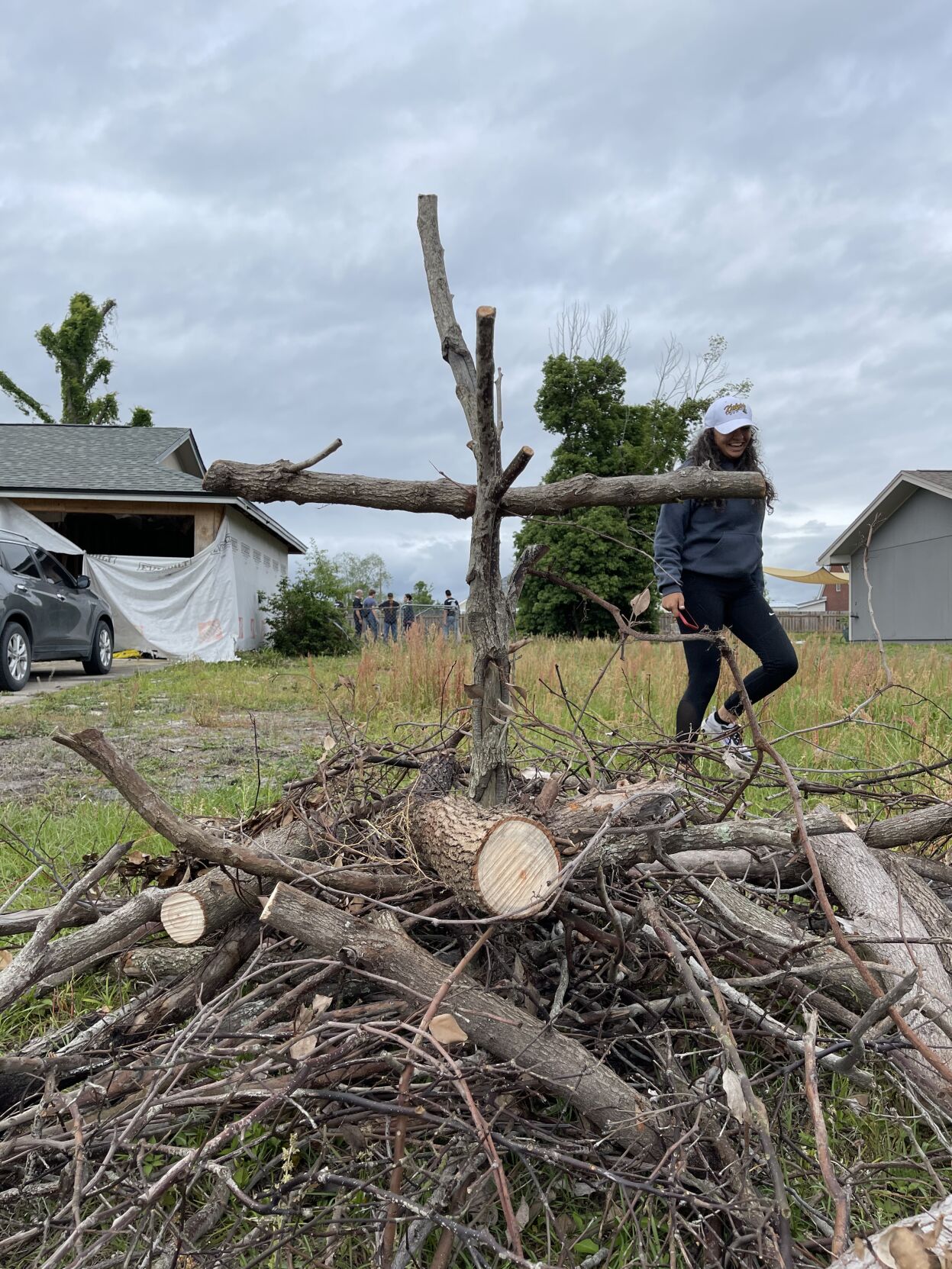 Students from UCF Catholic Campus Ministry spend their Spring Break helping others by cleaning up existing debris from Hurricane Michael and recent tornadoes in Panama City, April 11-217. (COURTESY)